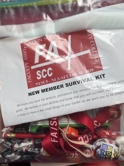 the new member survival kit contains items helpful to members such as bookmarks, lanyard, granola bars, chalk, and tissues