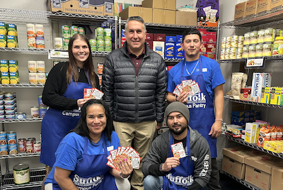 Pete DiGregorio at the Grant food pantry with students