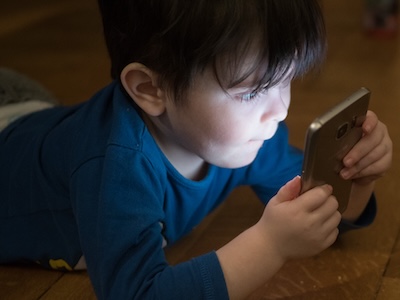 small child on a cell phone