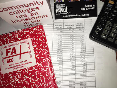 photo of FA notebook, notepad, calculator