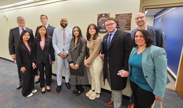 Dante Morelli, right, with SCCC admin and students advocating in Albany, Feb 2025