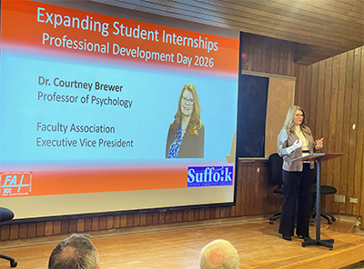 Courtney Brewer presenting on stage during PDD